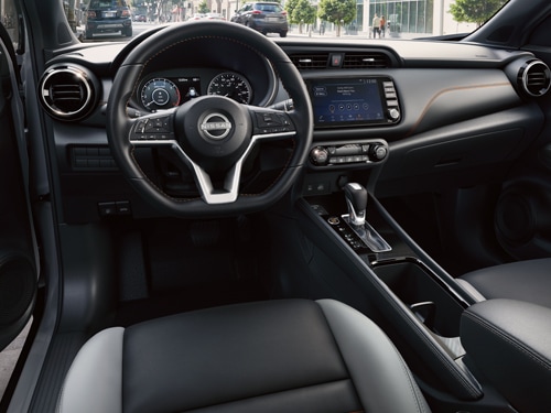2024 Nissan Kicks cockpit, seats, and steering wheel