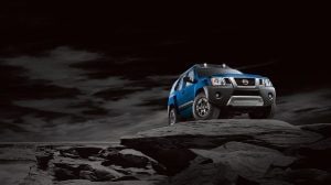 Front View of Blue Xterra on Hill