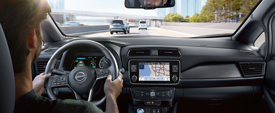 2024 Nissan LEAF in traffic illustrating driver assist lane sensors